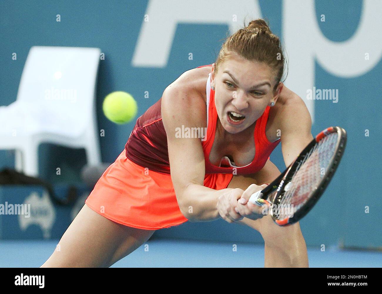 Halep Simona Halep of Romania returns a shot in her match against Caroline ...