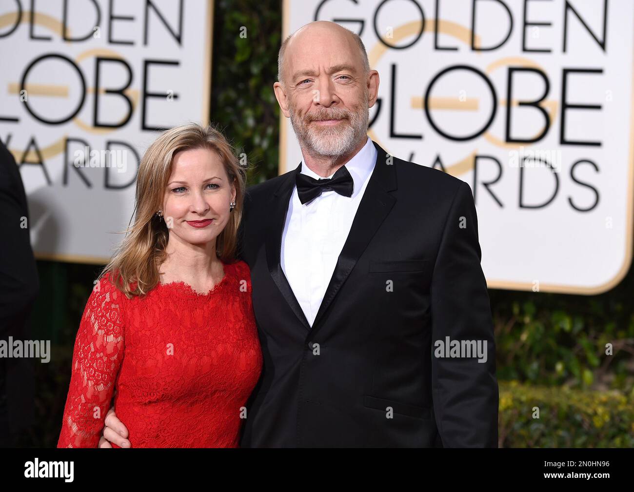 Michelle Schumacher, left, and J. K. Simmons arrives at the 73rd annual