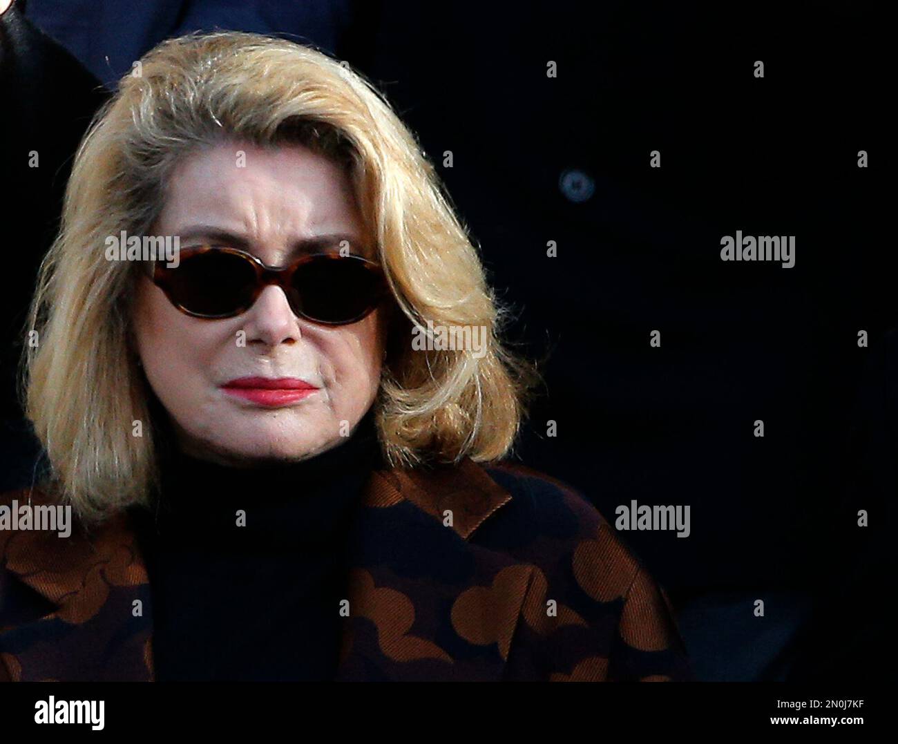 French actress Catherine Deneuve leaves the SaintSulpice church after