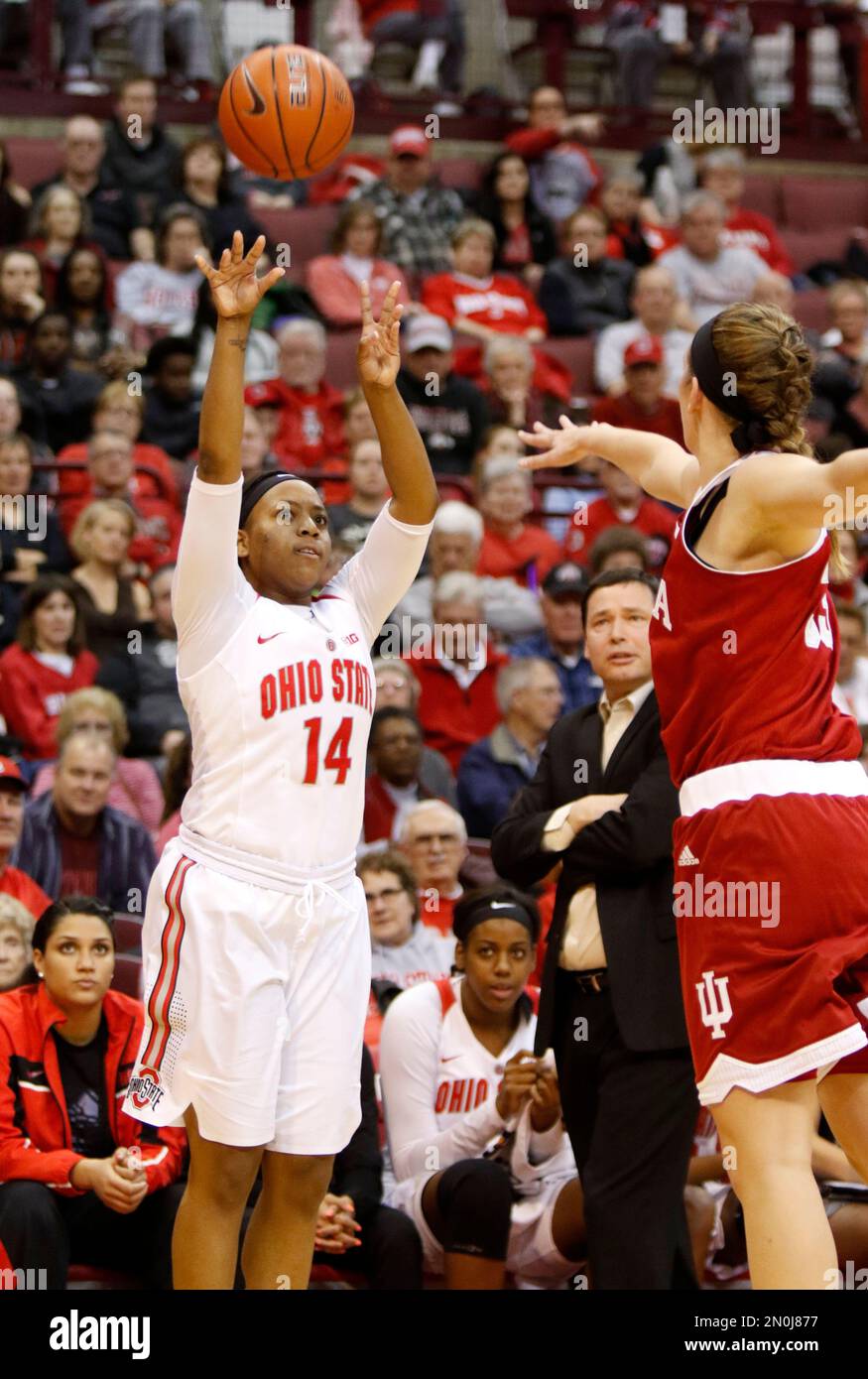 Ohio State's Ameryst Alston, left, goes up for a shot against Indiana's ...