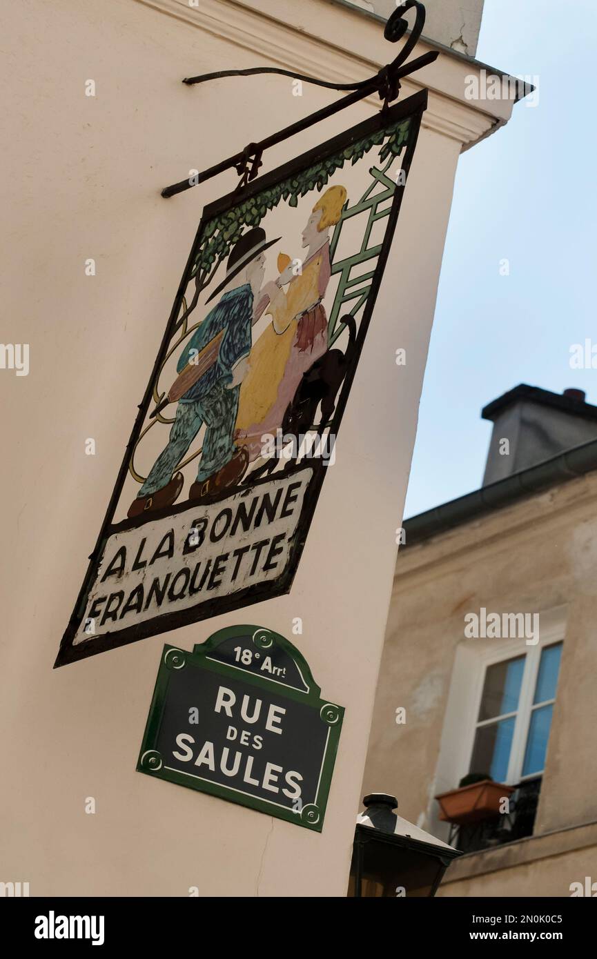 PARIS, FRANCE - MAY 07, 2011:  Colourful sign outside the La Bonne Franquette restaurant on the corner of Rue de la Roquette and Rue des Saules in Mon Stock Photo