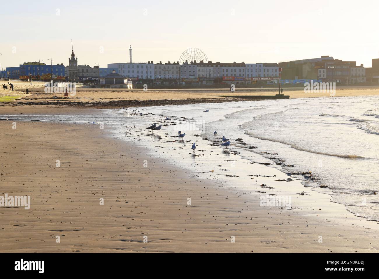 Winter sunshine on Margate beach at low tide, in north Kent, UK Stock