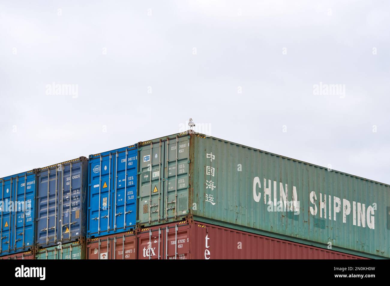 Typical steel shipping containers stacked up on Felixtowe docks, Suffolk, UK Stock Photo