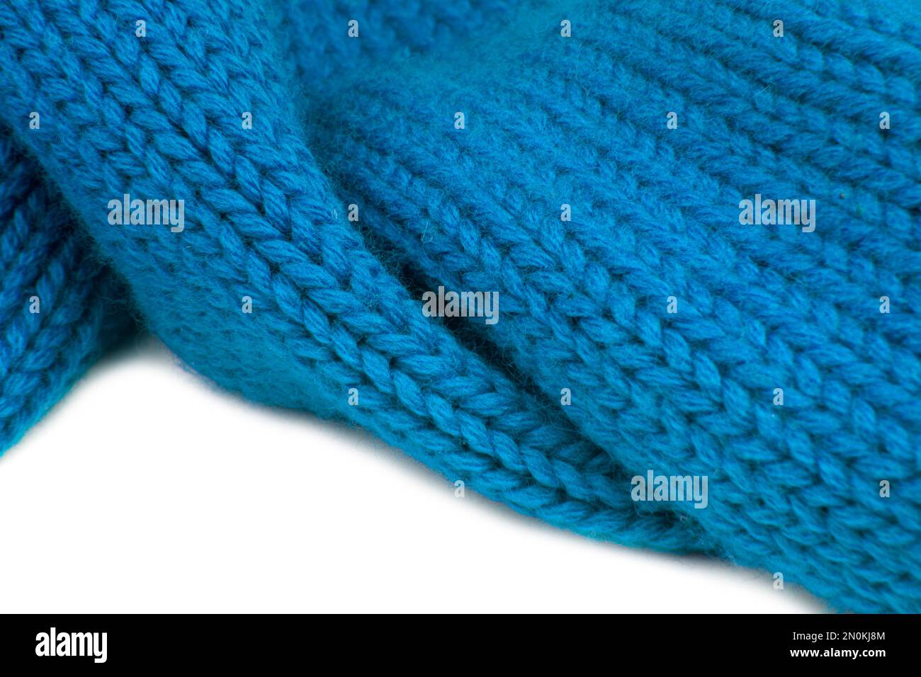 Woolen blue knitted warm texture fabric background Stock Photo