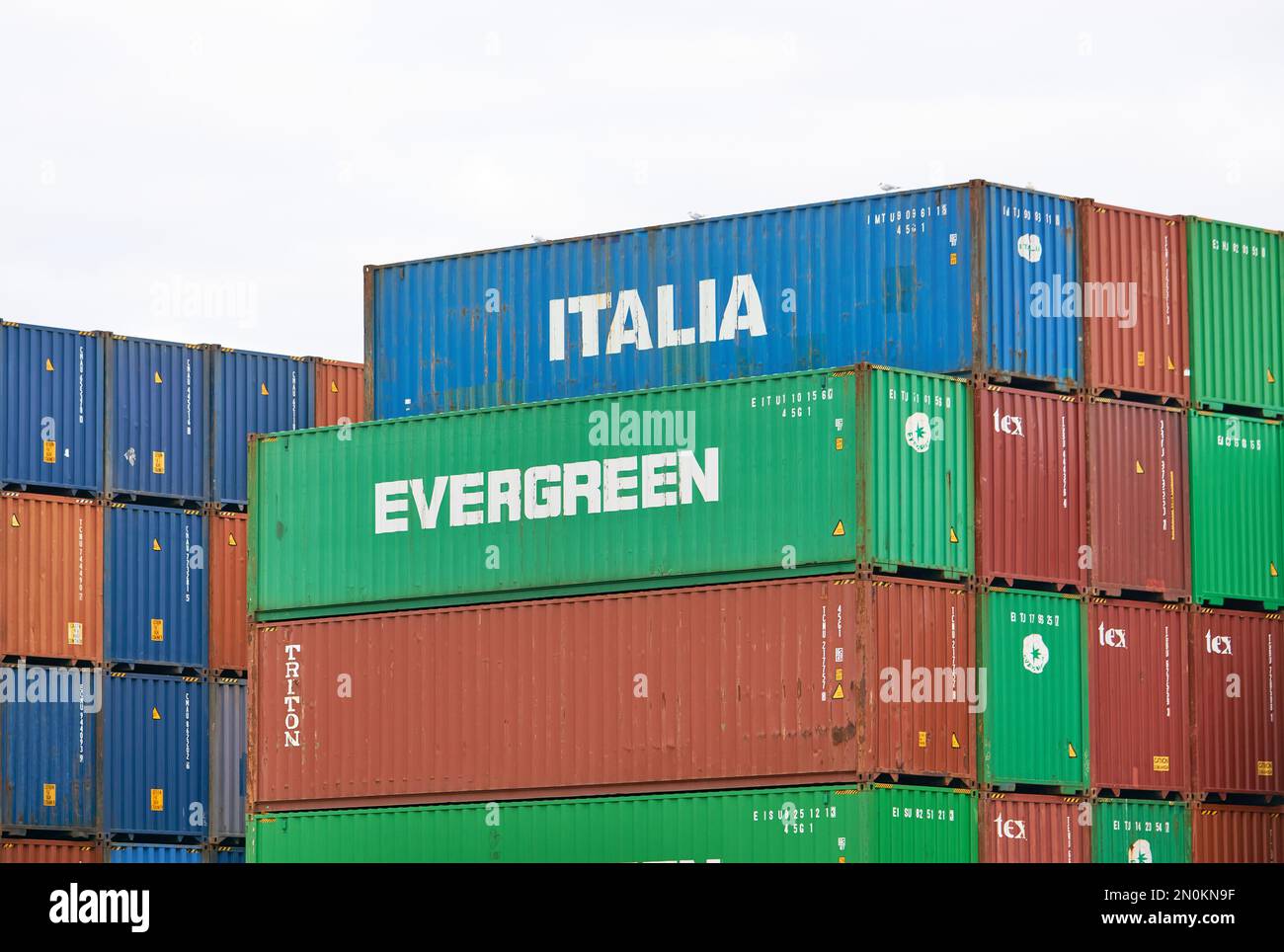 Typical steel shipping containers stacked up on Felixtowe docks, Suffolk, UK Stock Photo