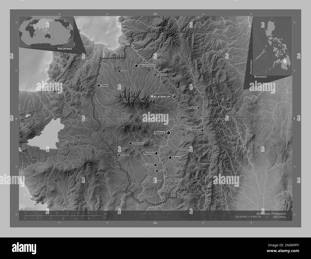 Bukidnon, province of Philippines. Grayscale elevation map with lakes and rivers. Locations and names of major cities of the region. Corner auxiliary Stock Photo