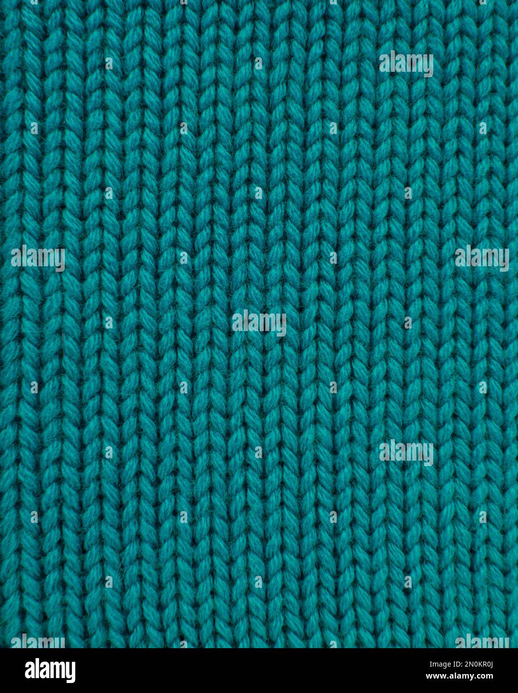 Woolen blue knitted warm texture fabric background Stock Photo