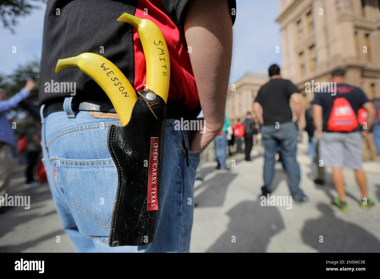 FILE In this Jan. 26, 2015, file photo, Jason Green wears a holster