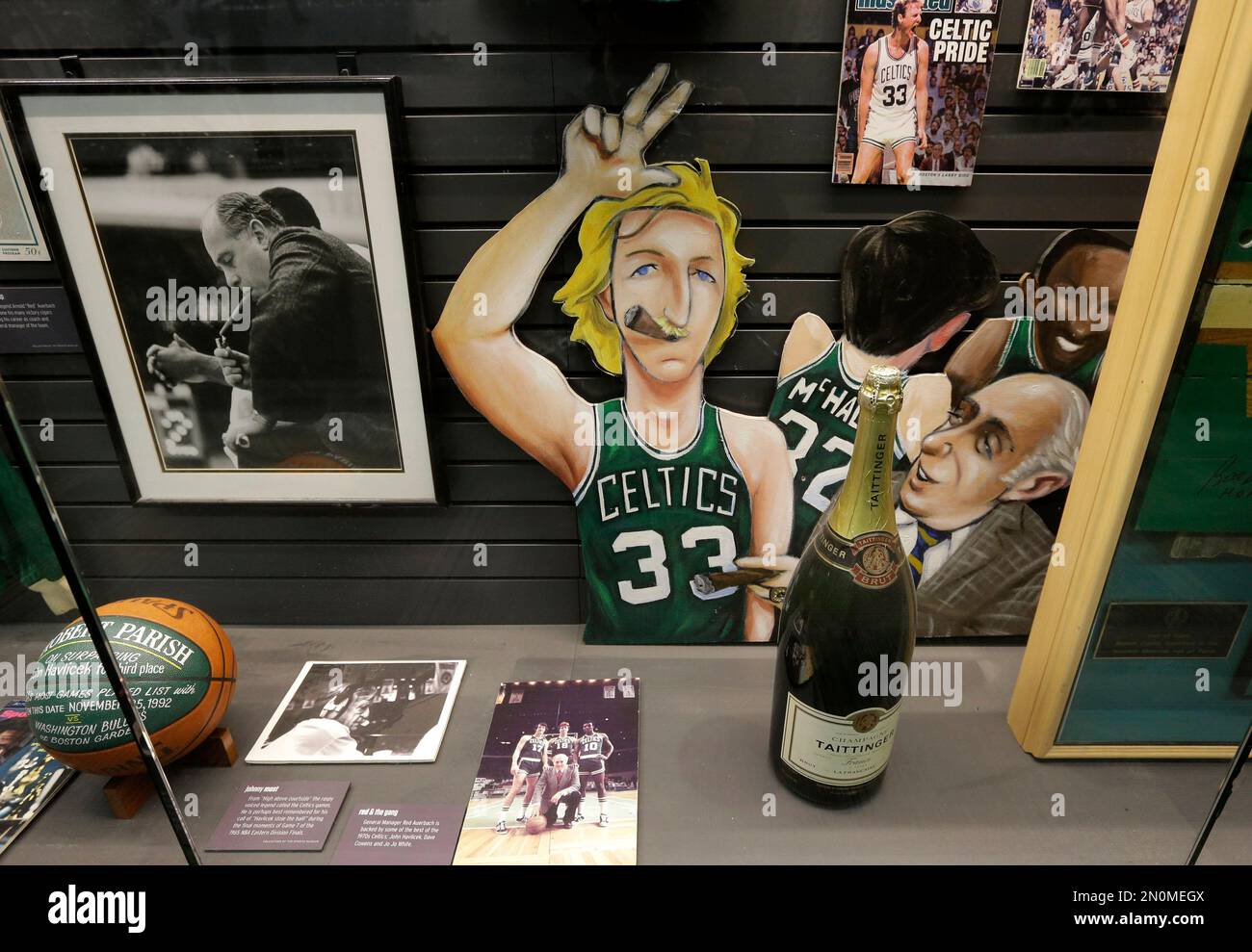 https://c8.alamy.com/comp/2N0MEGX/in-this-thursday-dec-17-2015-photo-a-depiction-of-former-boston-celtics-basketball-player-larry-bird-center-rests-in-a-display-case-near-a-photograph-of-former-celtics-coach-red-auerbach-left-in-an-exhibit-in-the-sports-museum-at-the-td-garden-in-boston-curators-have-teamed-up-with-professional-archivists-to-preserve-the-estimated-7-million-collection-much-of-which-is-kept-in-off-site-storage-that-was-threatened-by-last-winters-historic-snows-ap-photosteven-senne-2N0MEGX.jpg
