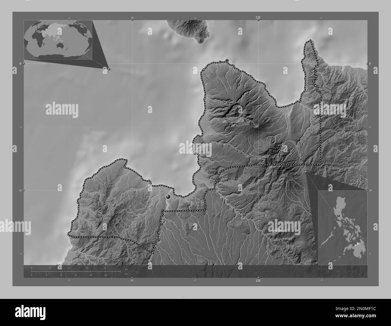 Misamis Oriental, province of Philippines. Grayscale elevation map with lakes and rivers. Corner auxiliary location maps Stock Photo