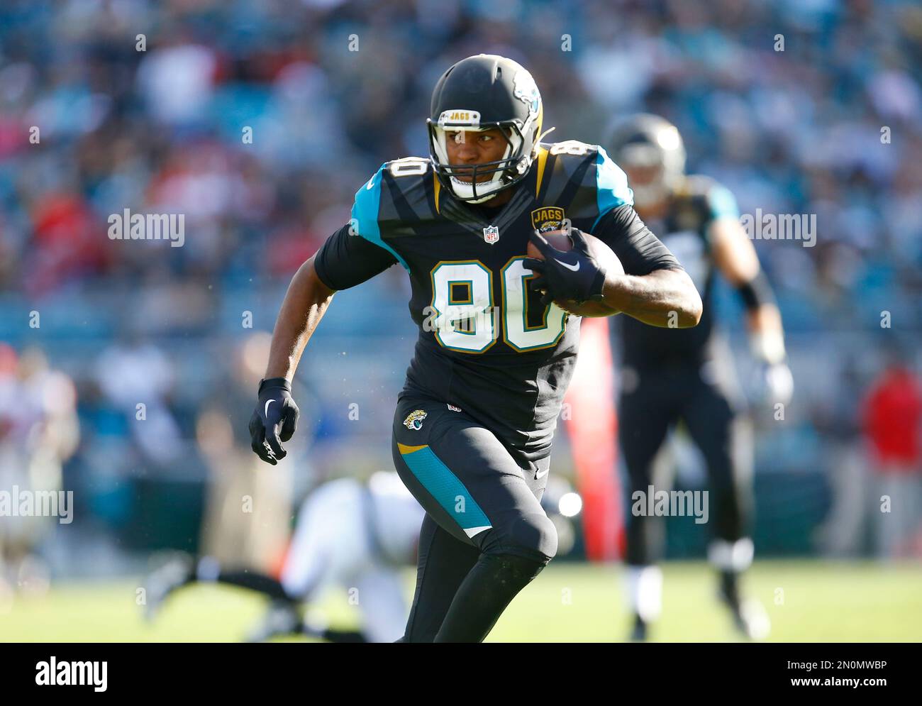 Jacksonville Jaguars tight end Julius Thomas (80) runs with the ball