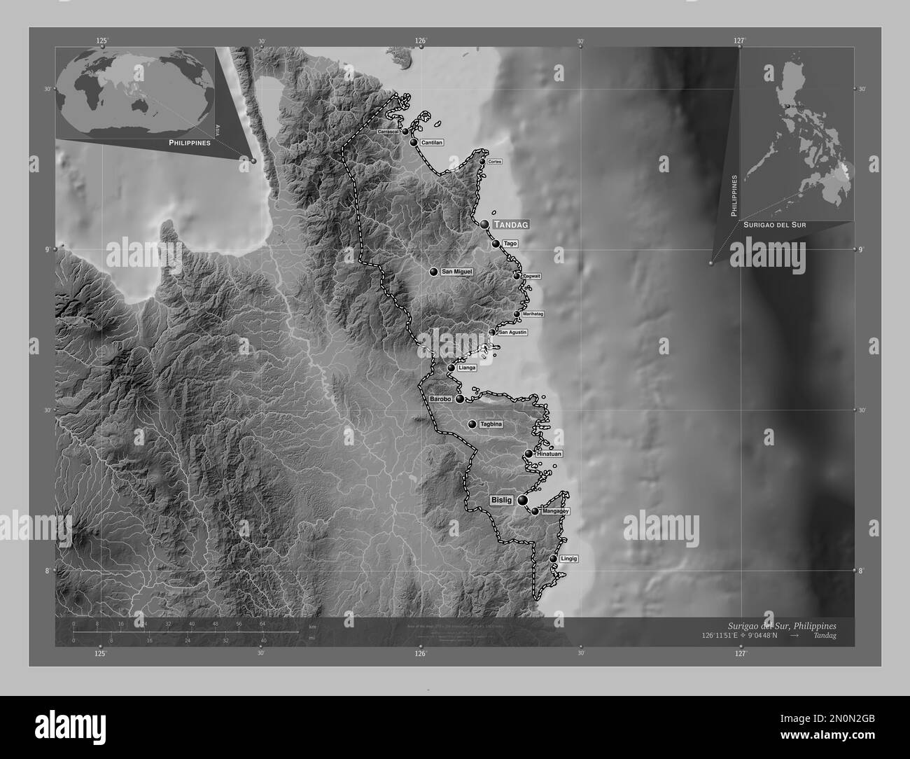 Surigao del Sur, province of Philippines. Grayscale elevation map with lakes and rivers. Locations and names of major cities of the region. Corner aux Stock Photo