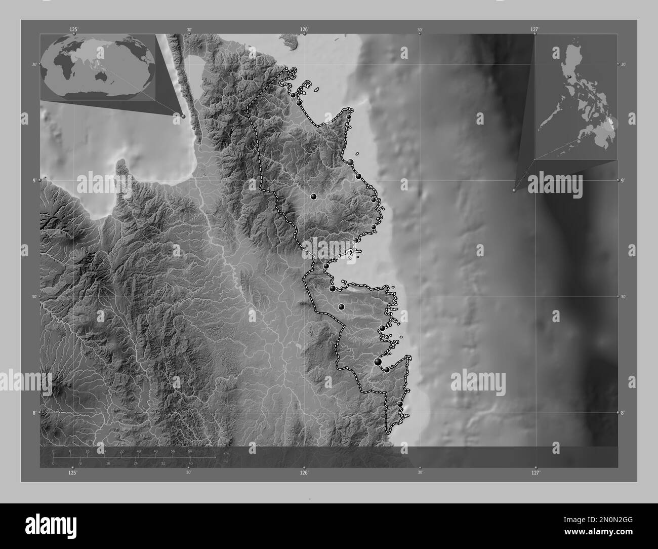 Surigao del Sur, province of Philippines. Grayscale elevation map with lakes and rivers. Locations of major cities of the region. Corner auxiliary loc Stock Photo