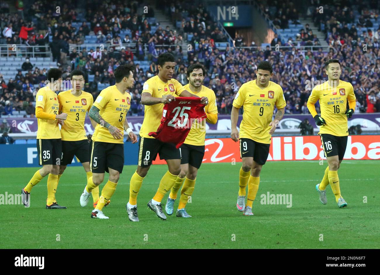 After scoring a goal, Guangzhou Evergrande FC's Paulinho of