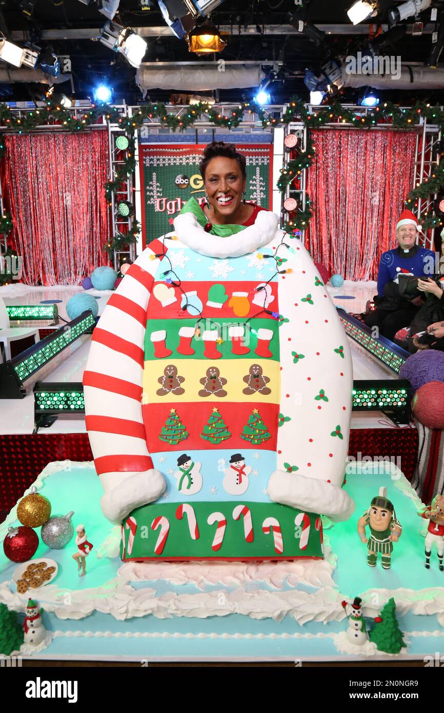 IMAGE DISTRIBUTED FOR COUNTRY CROCK Good Morning America co host Robin Roberts celebrates National Ugly Christmas Sweater Day early with a Country Crock larger than life 4 foot tall ugly Christmas swe...