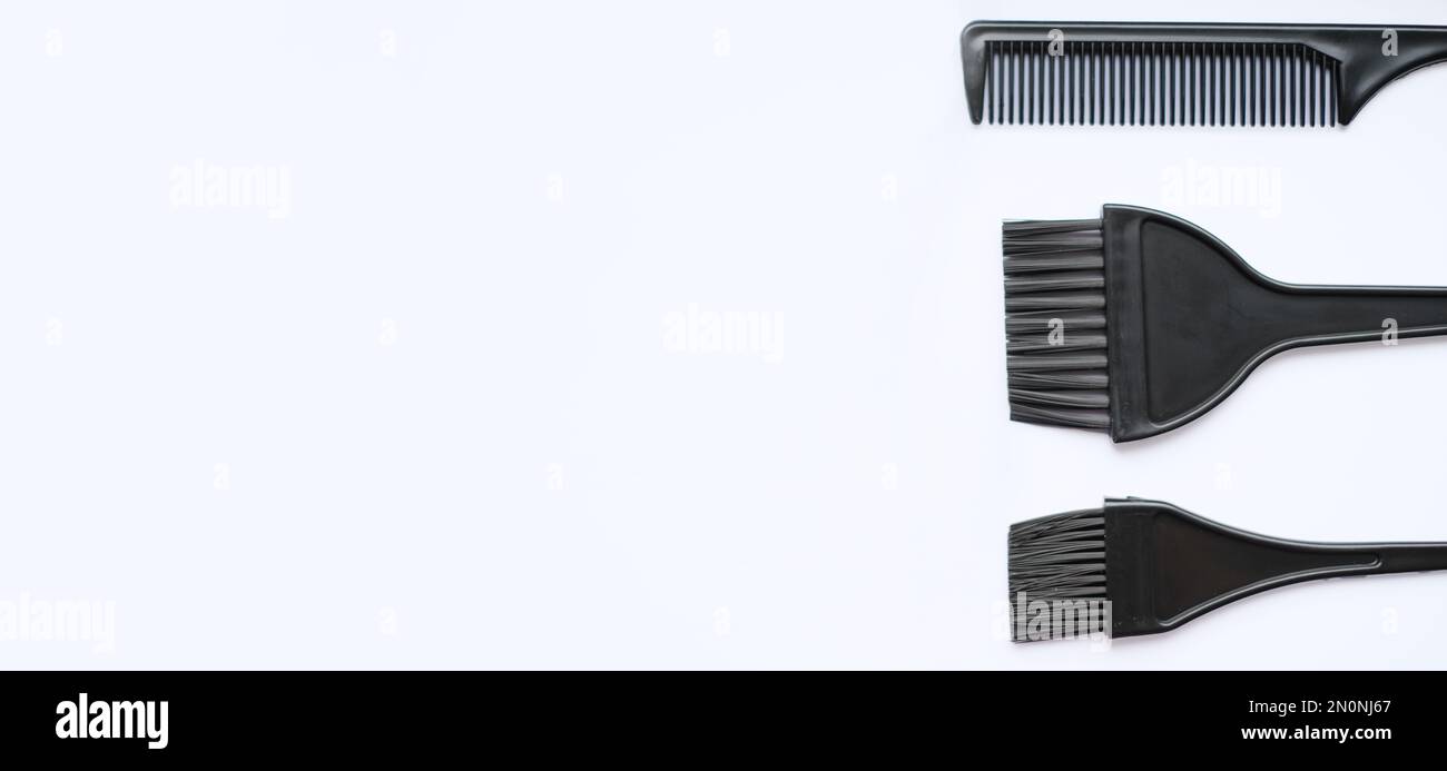 Top view, flat lay, hair coloring accessories, brushes and combs