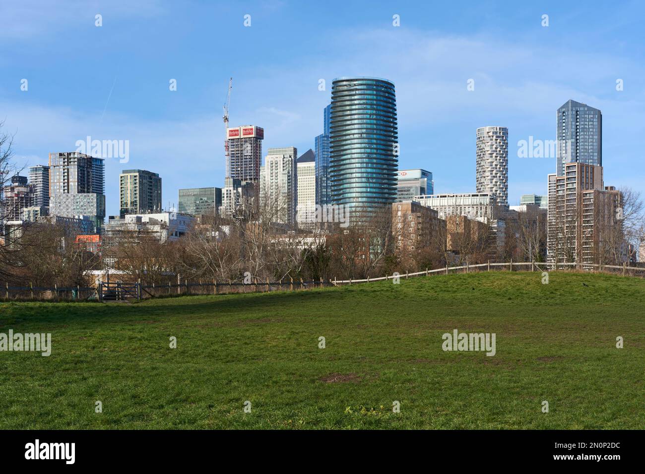 Canary Wharf business district viewed from Mudshute Park on the Isle of Dogs, London Docklands, UK Stock Photo