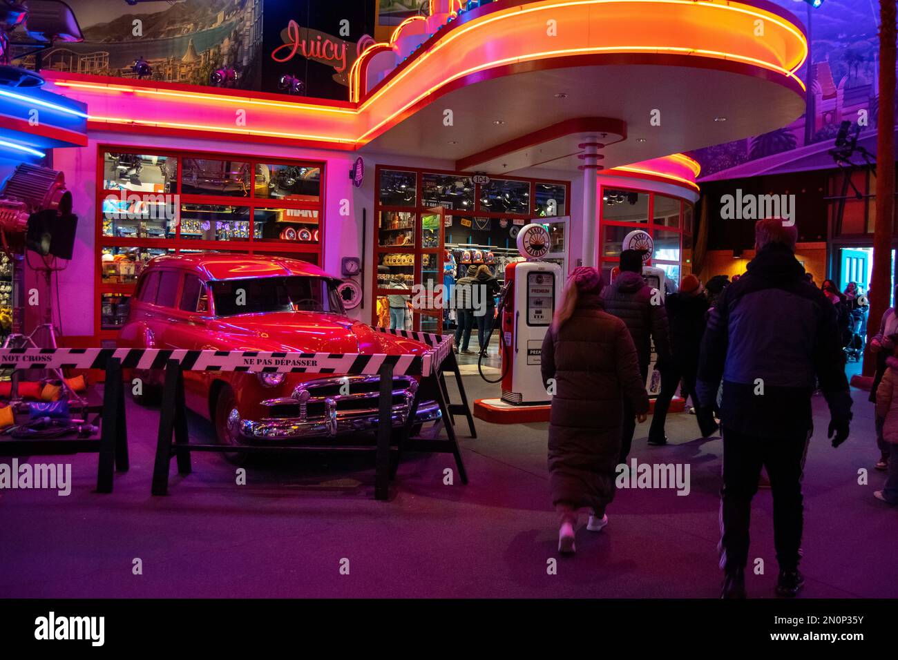 Disneyland Paris Walt Disney Studios, studio 1, fuel station scenery with neon lights. Stock Photo