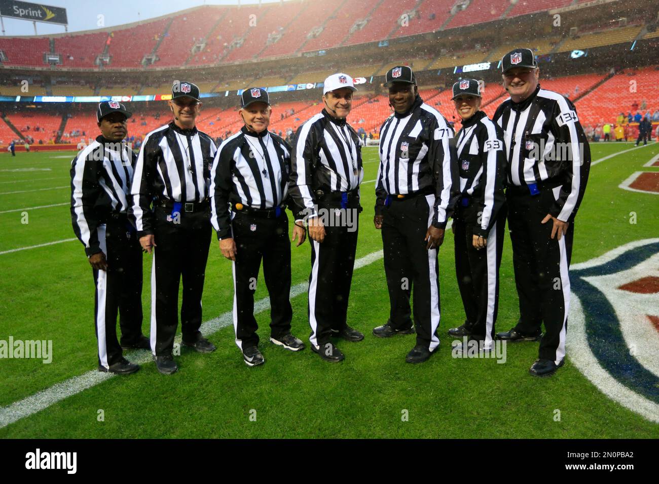 NFL game officlals, from left, replay official Brian Matoren, down judge  Tom Stephan (68), field judge Lee Dyer (27), umpire Ruben Fowler (71),  referee Walt Anderson (66), side judge Rick Patterson (15)