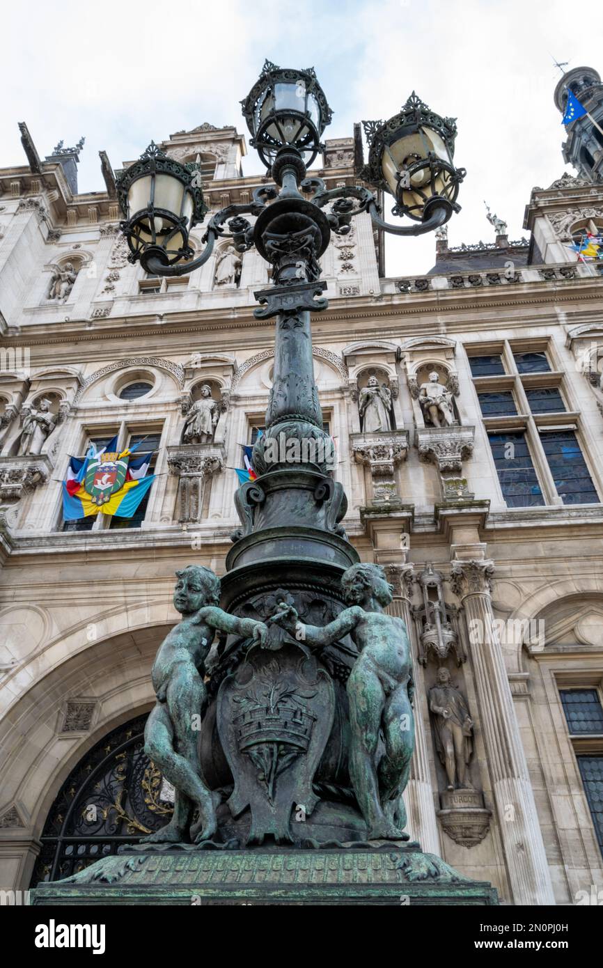 Paris Hotel de Ville beautiful statues Haussmann Renaissance style. Paris sculptures on public spaces. Art on public illumination. Blason de la Ville de Paris Stock Photo