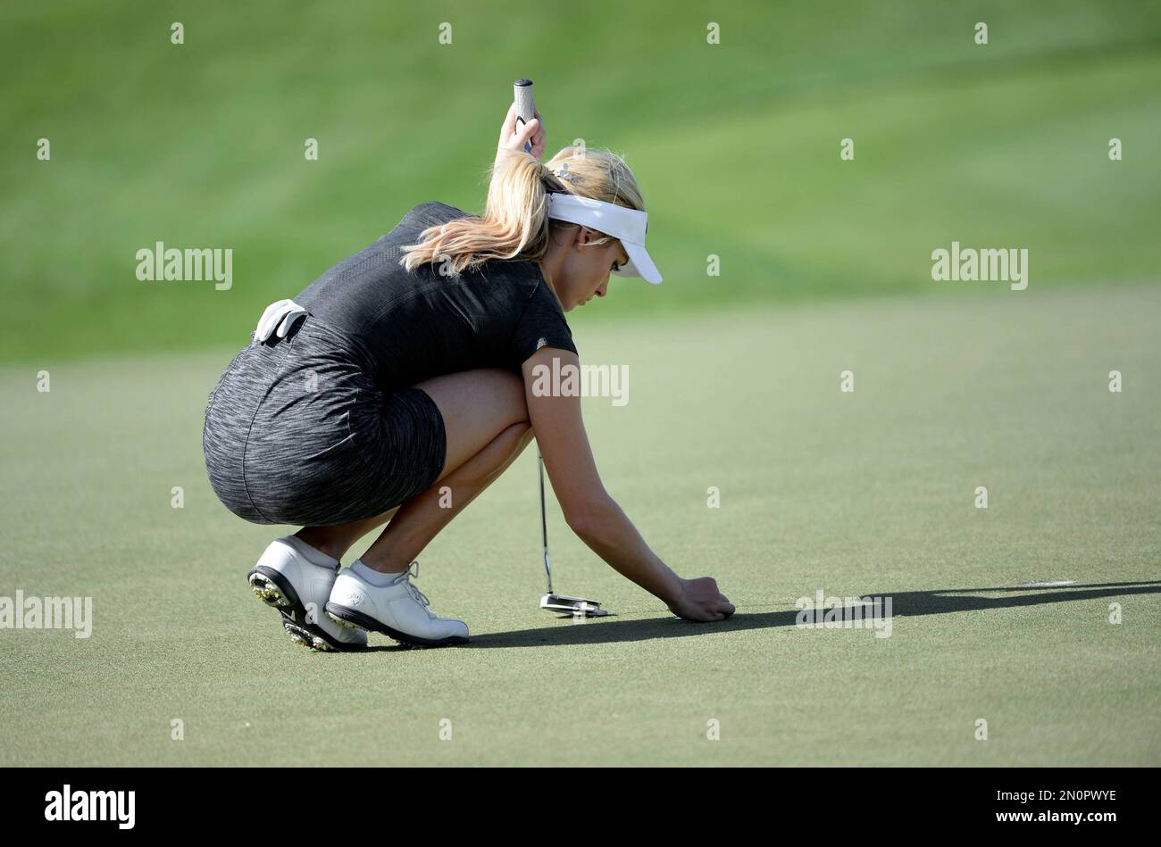paige-spiranac-of-the-united-states-puts-the-ball-on-the-fourth-green
