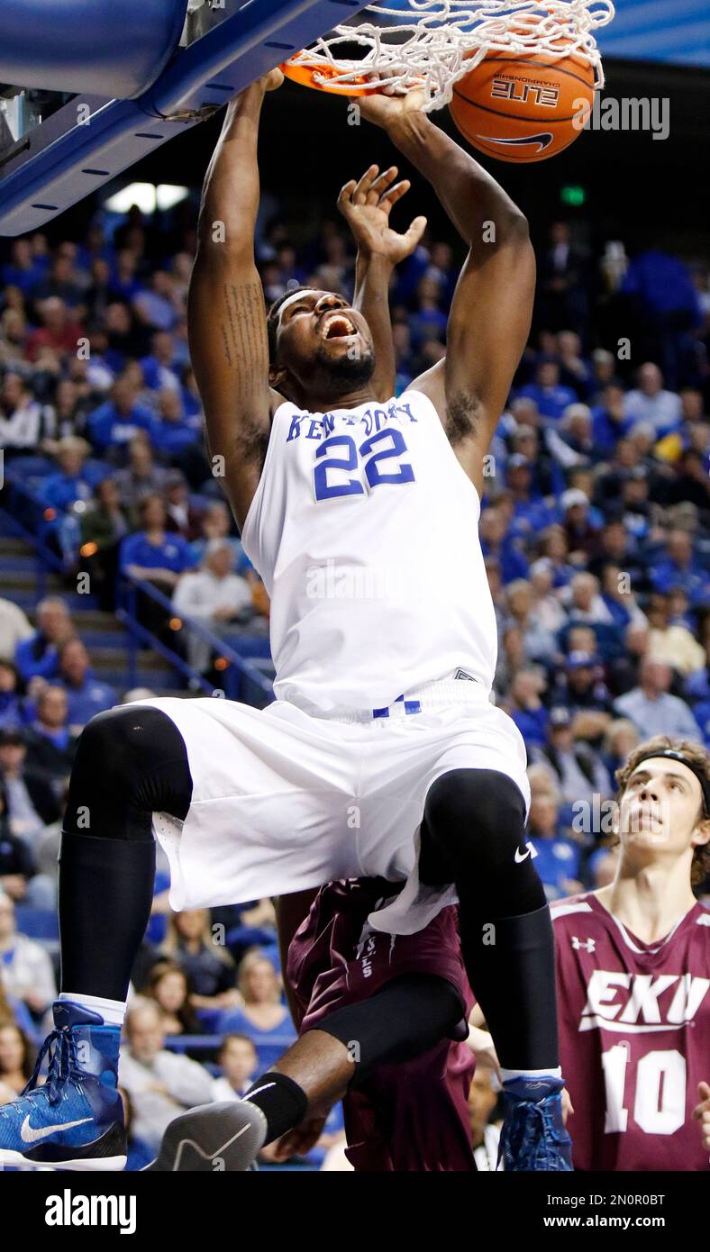 Kentucky's Alex Poythress (22) dunks near Eastern Kentucky's Nick Mayo