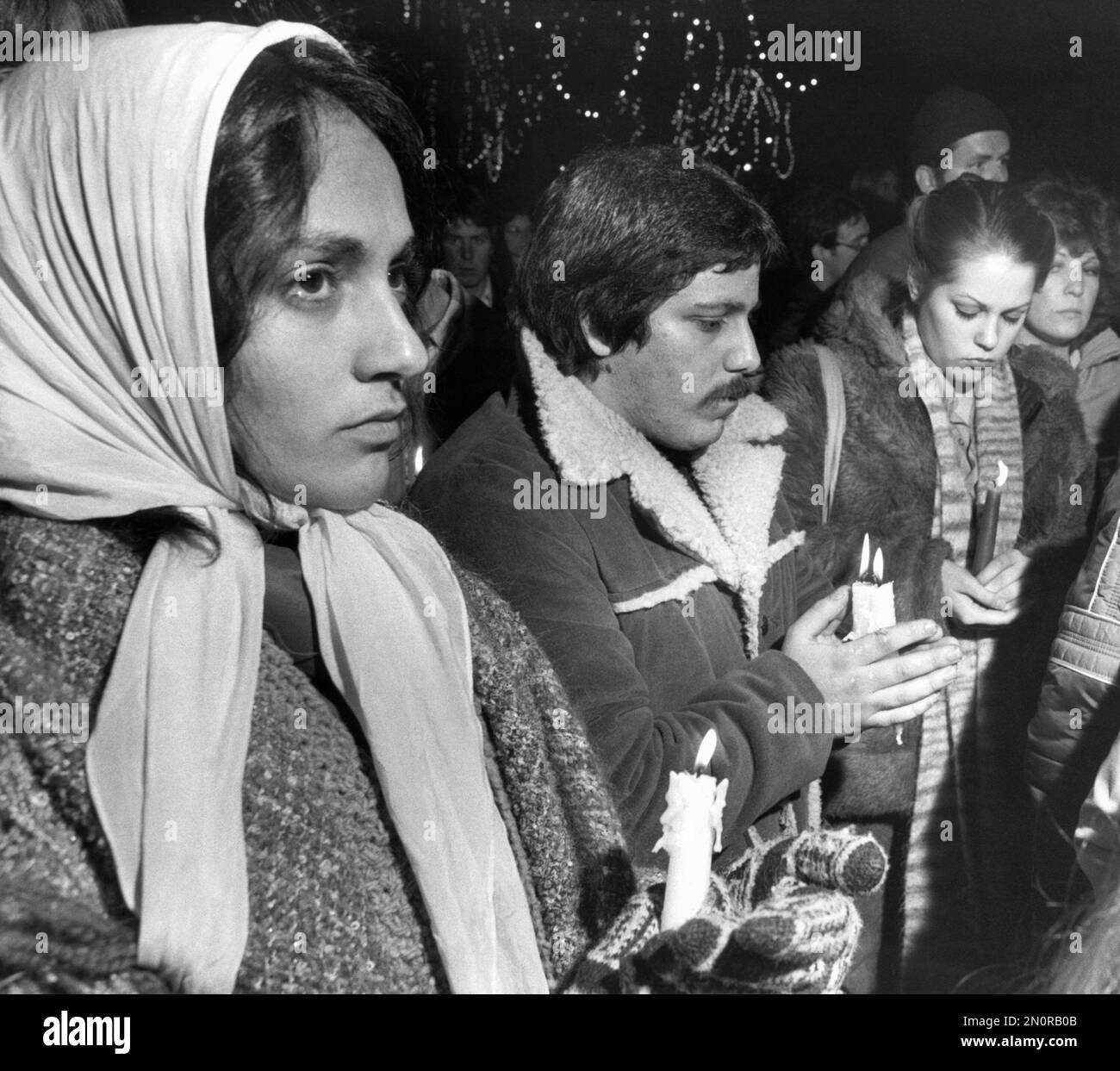 FILE In this Dec. 10, 1980, file photo, people participate in a