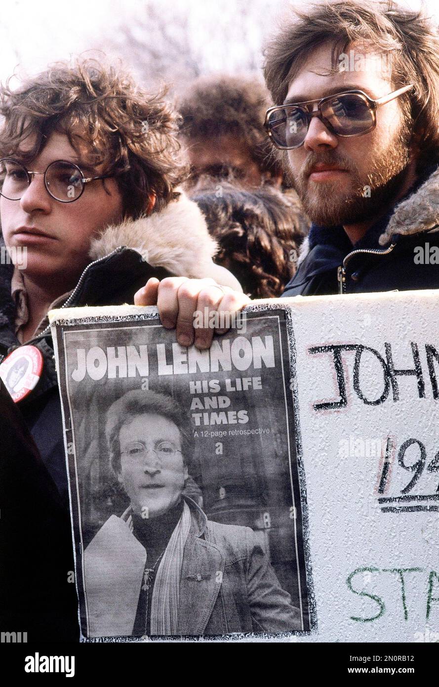 FILE In This Dec 14 1980 File Photo A Crowd Gathers During A file-in-this-dec-14-1980-file-photo-a-crowd-gathers-during-a