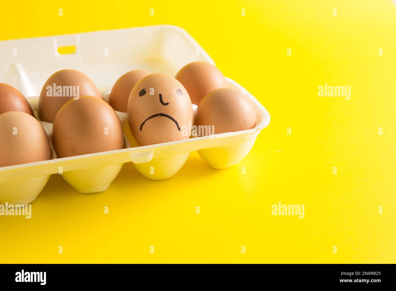 Eggs on a yellow background Stock Photo