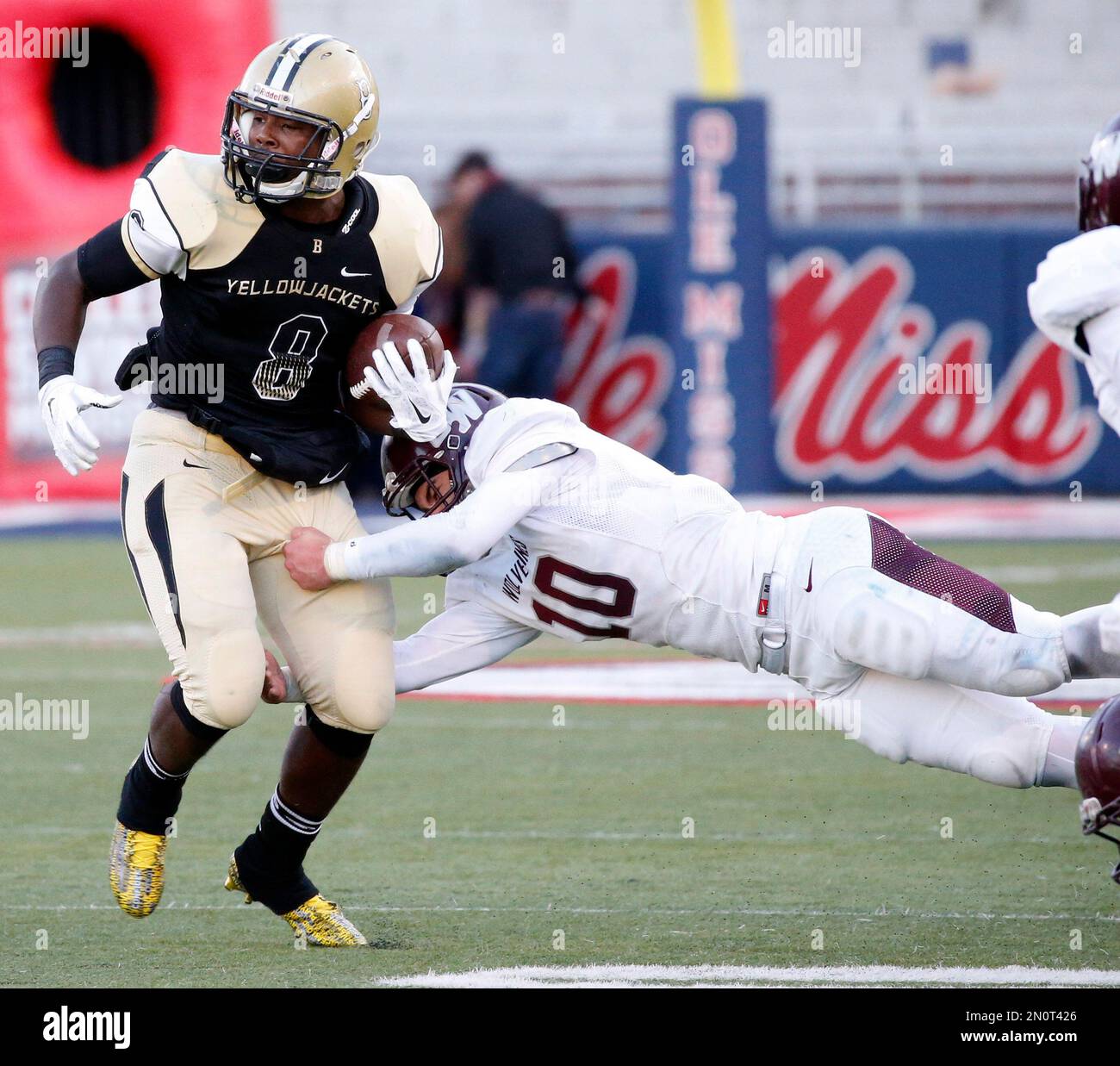 Bassfield tightend Racheem Booth (8) steps out of a tackle by East