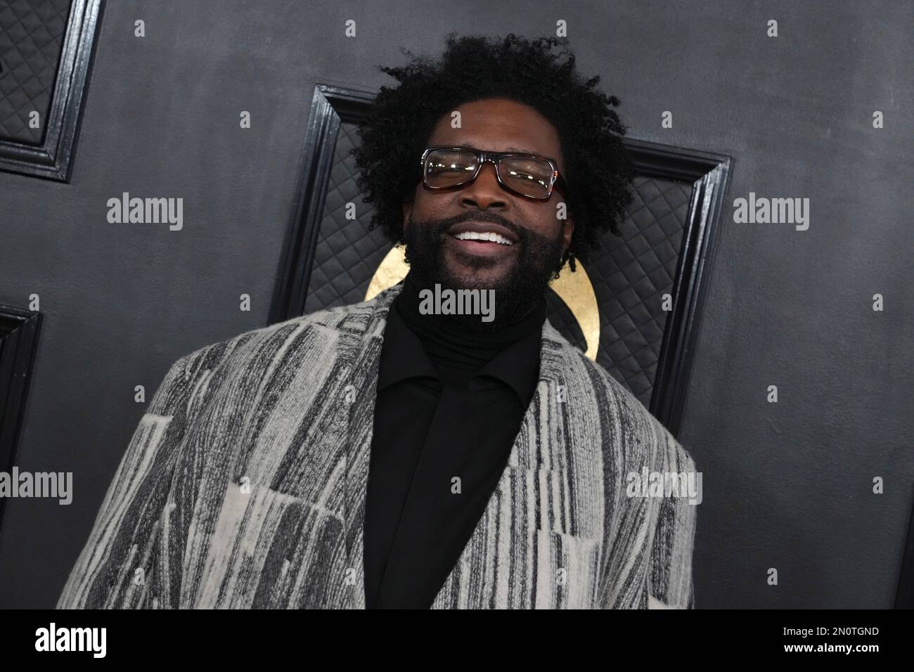 Questlove arrives at the 65th annual Grammy Awards on Sunday, Feb. 5