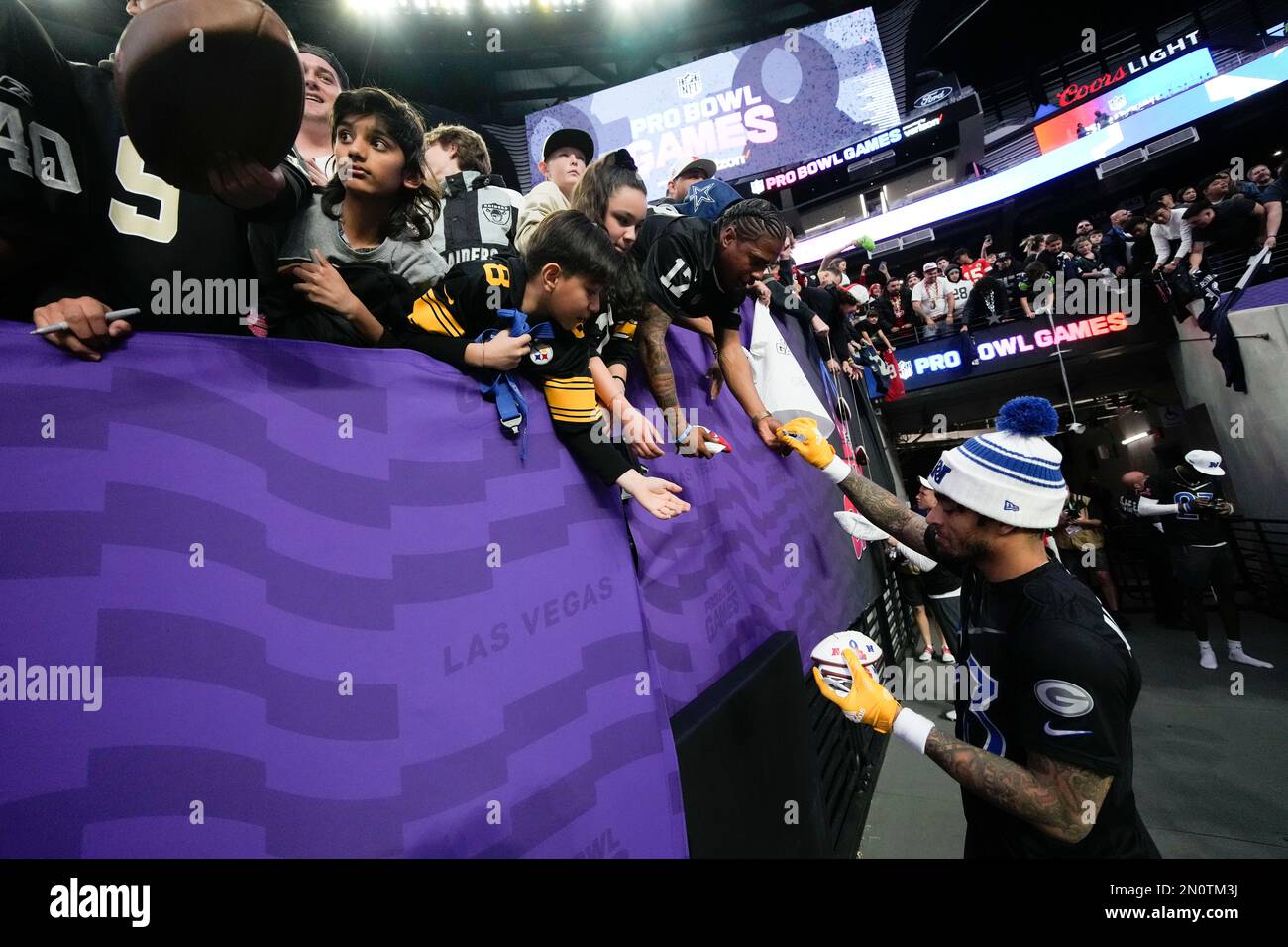 NFC cornerback Jaire Alexander (23) of the Green Bay Packers signs