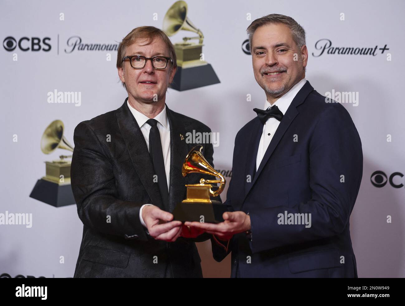 Michael Romanowski and Charlie Post pose with the Grammy for Best