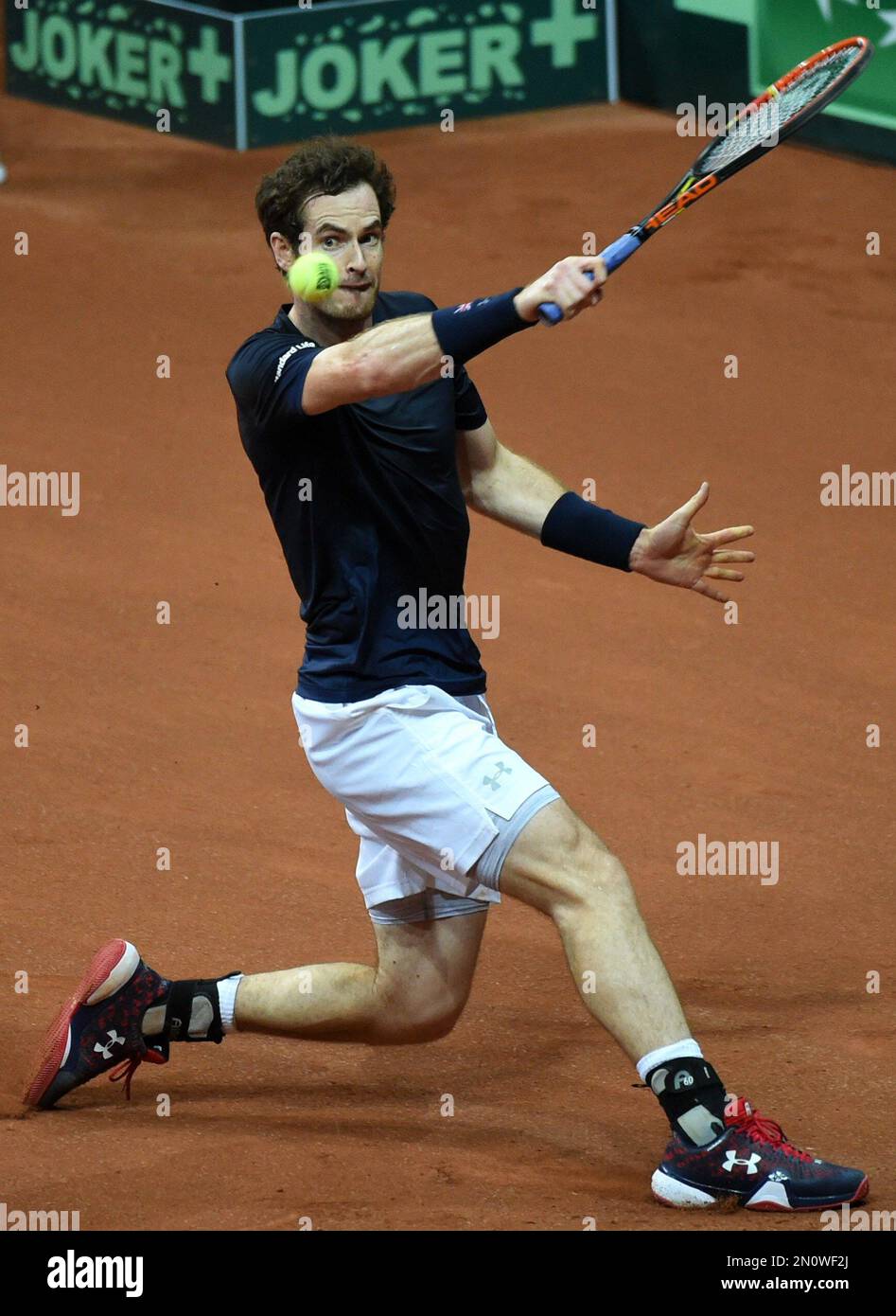 Britains Andy Murray returns a ball to Belgiums Ruben Bemelmans during their Davis Cup final tennis match at the Flanders Expo in Ghent, Belgium, Friday, Nov