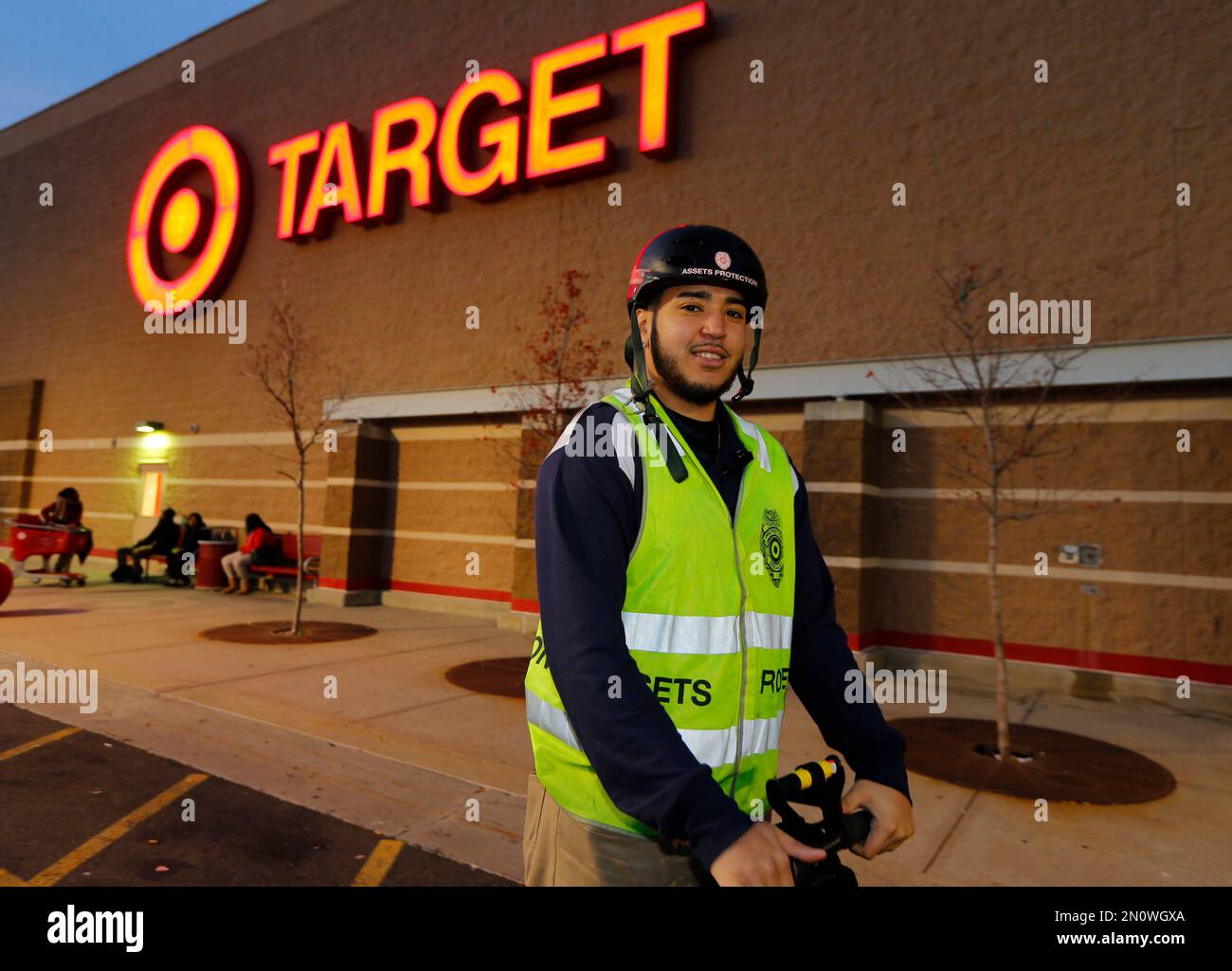 Target security specialist Carlos Quinones patrols shopping area at