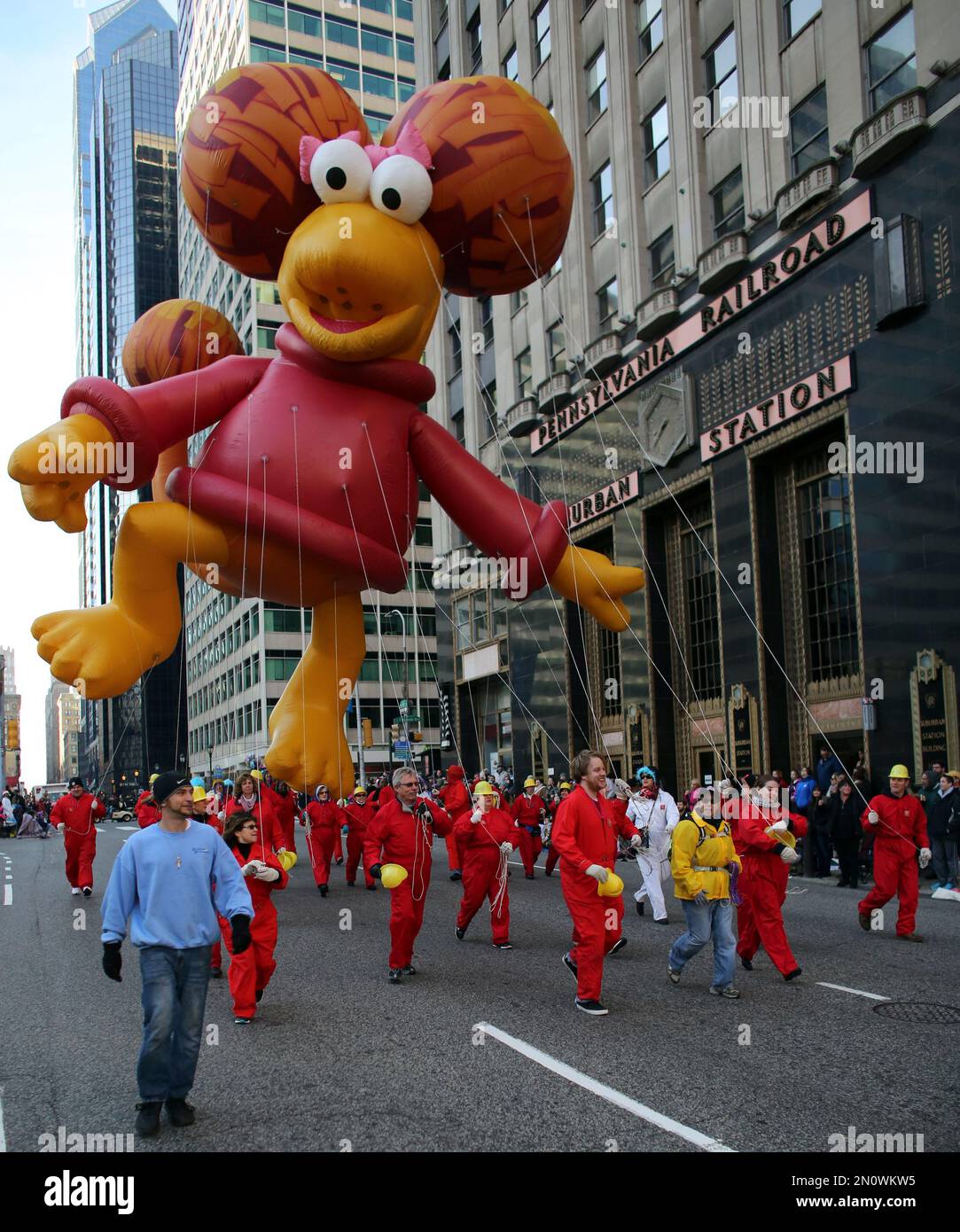 Handlers walk the Red from Fraggle Rock balloon down 16th Street, in ...