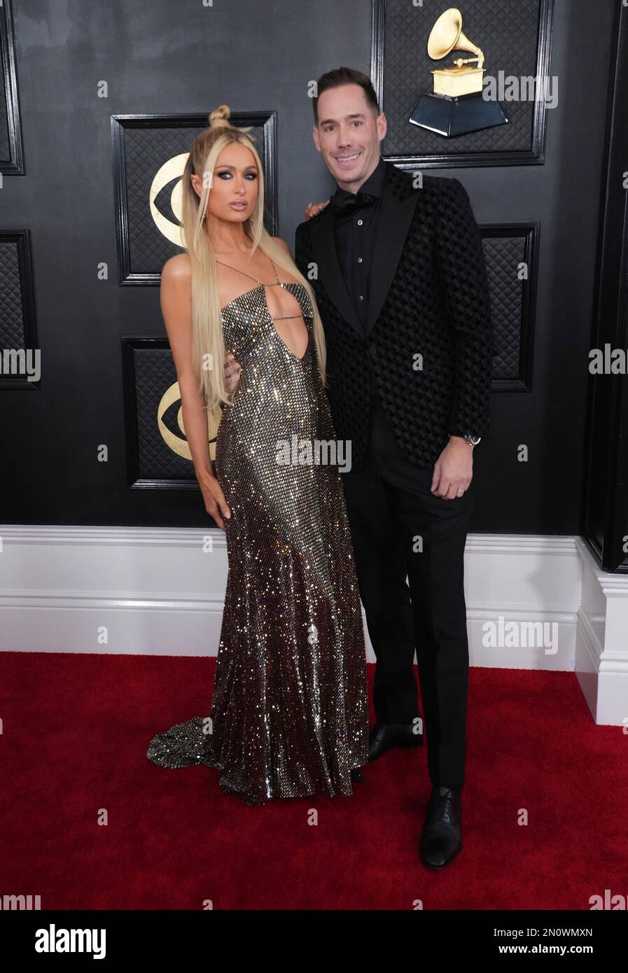 Paris Hilton, left, and Carter Reum arrive at the 65th annual Grammy