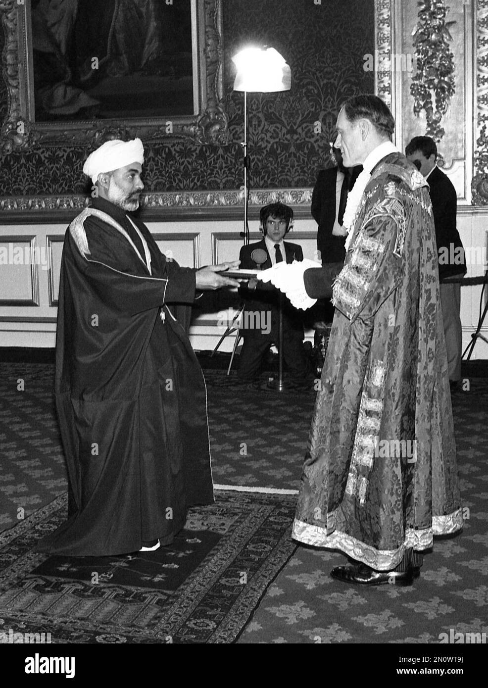 The Lord Mayor of the City of Westminster, London, Ian Harley, right, presents an address of