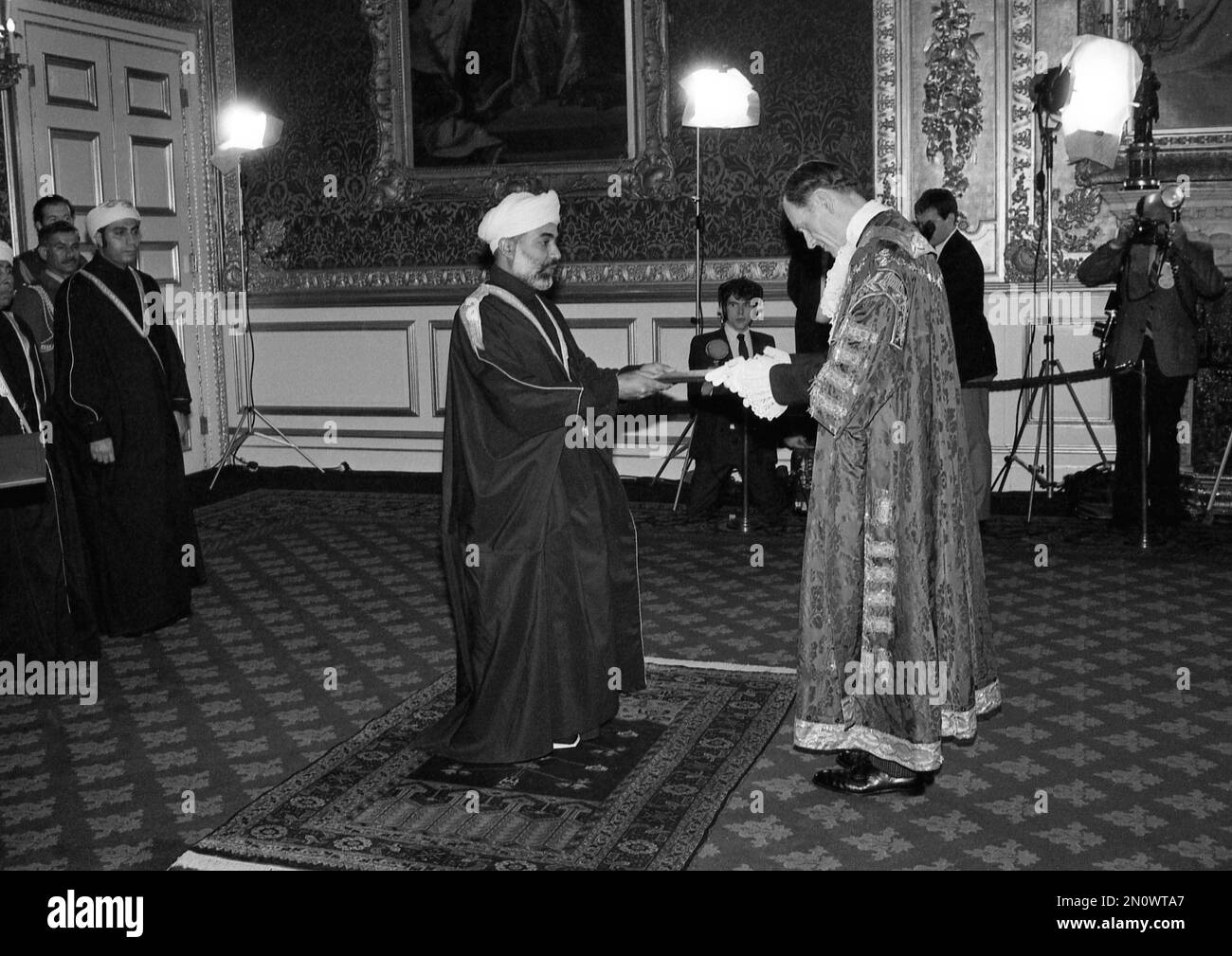 The Lord Mayor of the City of Westminster, London, Ian Harley, right, presents an address of