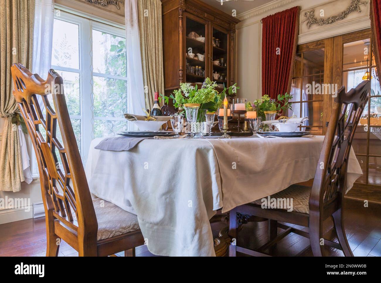 Set antique wooden dining table with 1850s dishes and hand sculptured