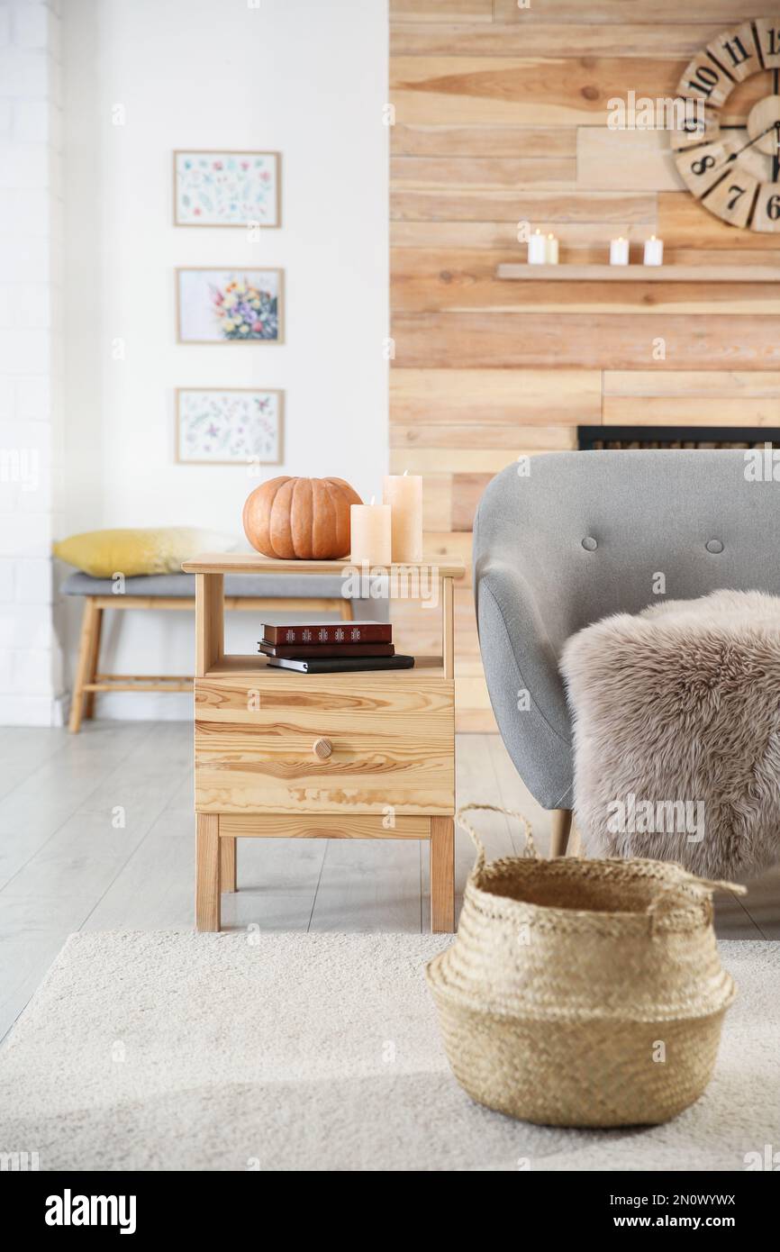 Cozy living room interior inspired by autumn colors Stock Photo - Alamy
