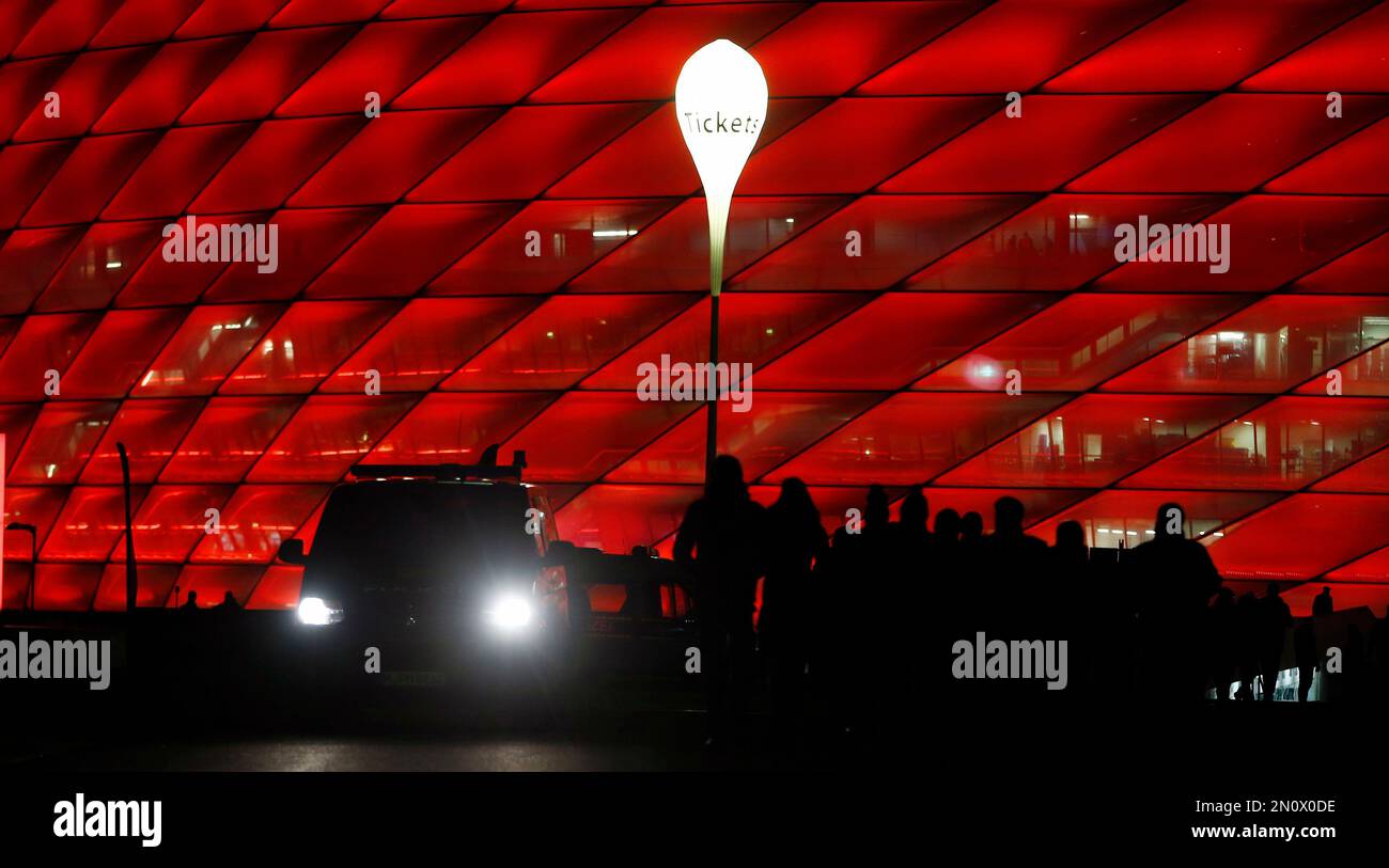 A police car patrols around prior to the Champions League Group F soccer  match between FC Bayern Munich and Olympiakos Piraeus at the Allianz Arena  stadium in Munich, Germany, Tuesday, Nov. 24,