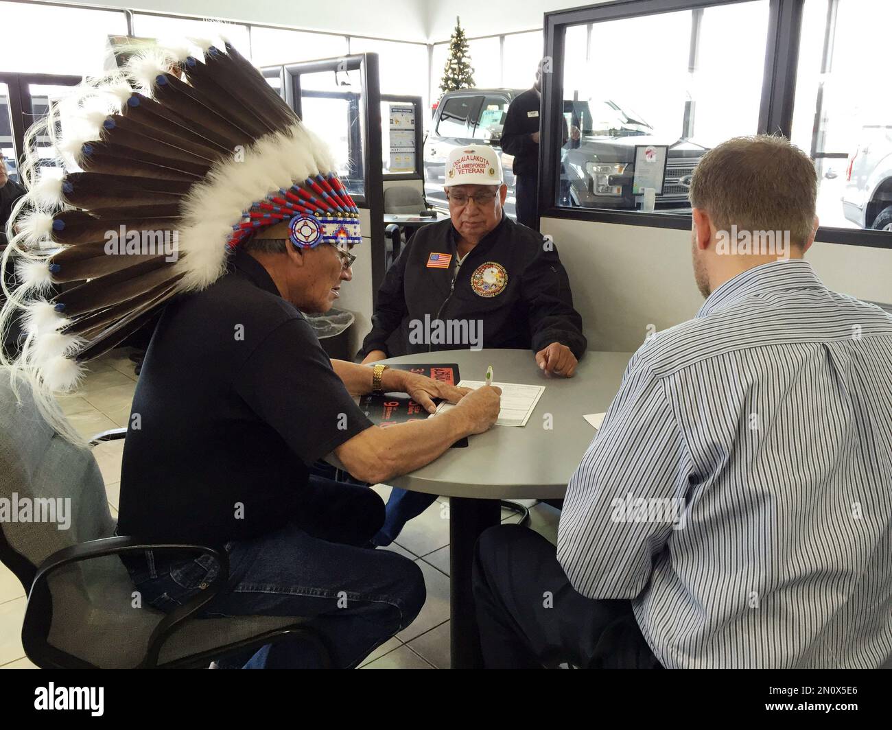 Oglala Sioux Tribe president John Yellow Bird Steele, left, and special