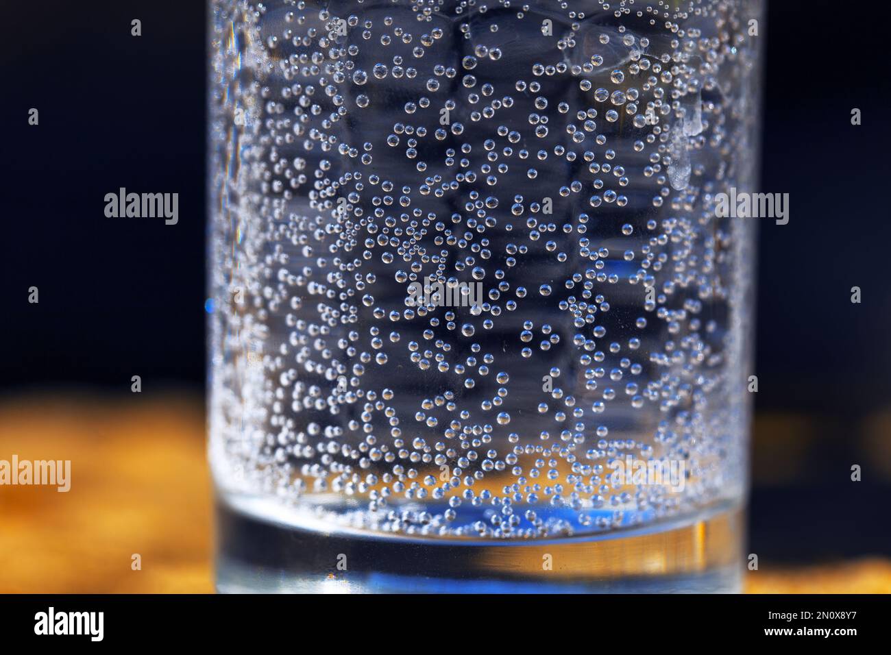 Sparkling water in transparent glass cup . Drinking soda water Stock Photo