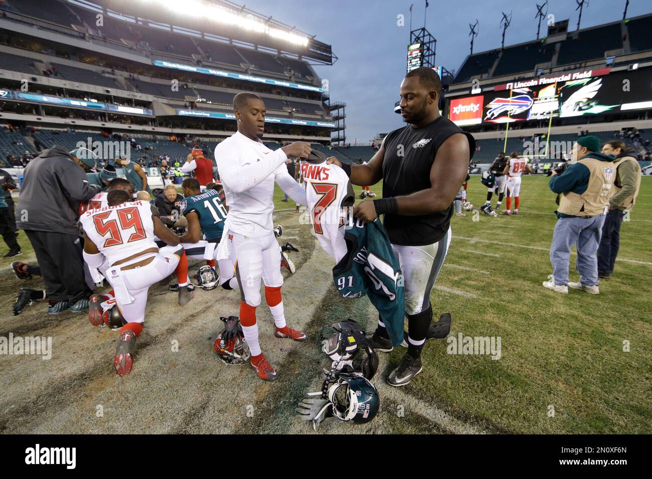Philadelphia Eagles' Fletcher Cox, right, and Tampa Bay Buccaneers