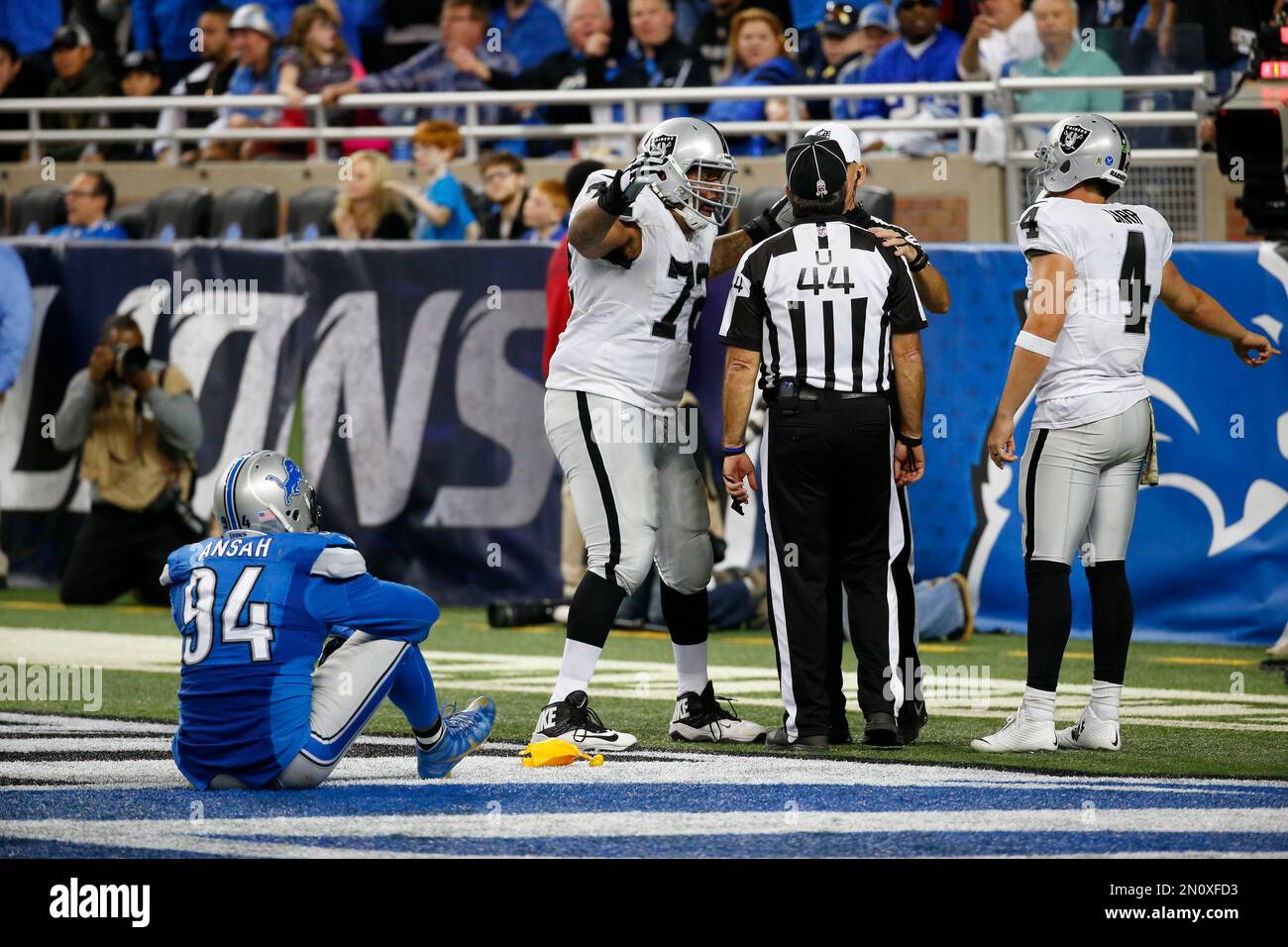 Oakland Raiders tackle Donald Penn (72) talks with umpire Jeff Rice (44 ...
