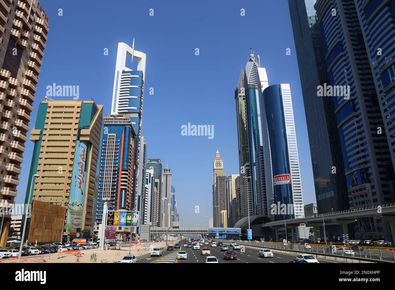 Dubai, UAE - February 14,2022: The longest road in the Emirates, the E11 or Sheikh Zayed Road. high-rise buildings towering over the scene. Sheikh Zay Stock Photo
