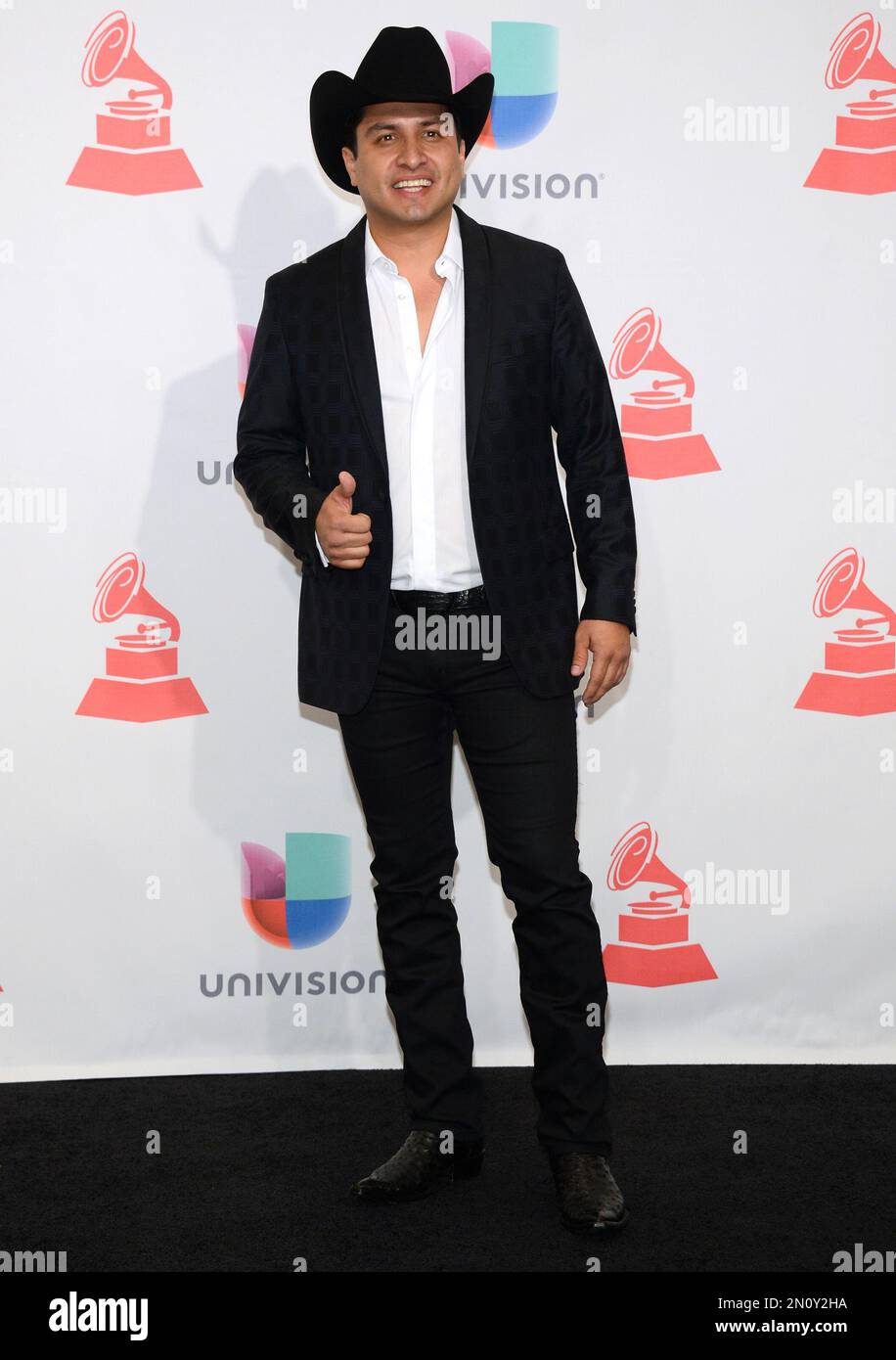 Julion Alvarez poses in the press room at the 16th annual Latin Grammy