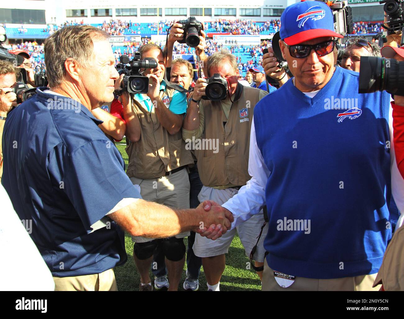 New England Patriots head coach Bill Belichick shakes hands with ...