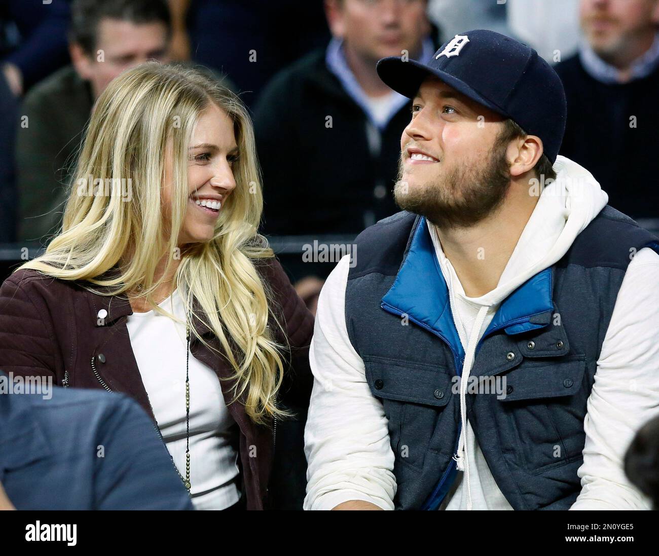 Kelly Stafford, wife of Detroit Lions quarterback Matthew Stafford talks  with her twins Chandler and Sawyer during pregame of an NFL football game,  Sunday, Oct. 20, 2019, in Detroit. (AP Photo/Rick Osentoski